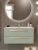 Тумба с раковиной подвесная Cezares Eco-cer-n 100 Светло-зеленый матовый. Ручки сатиновое золото, раковина CZR-8073-100